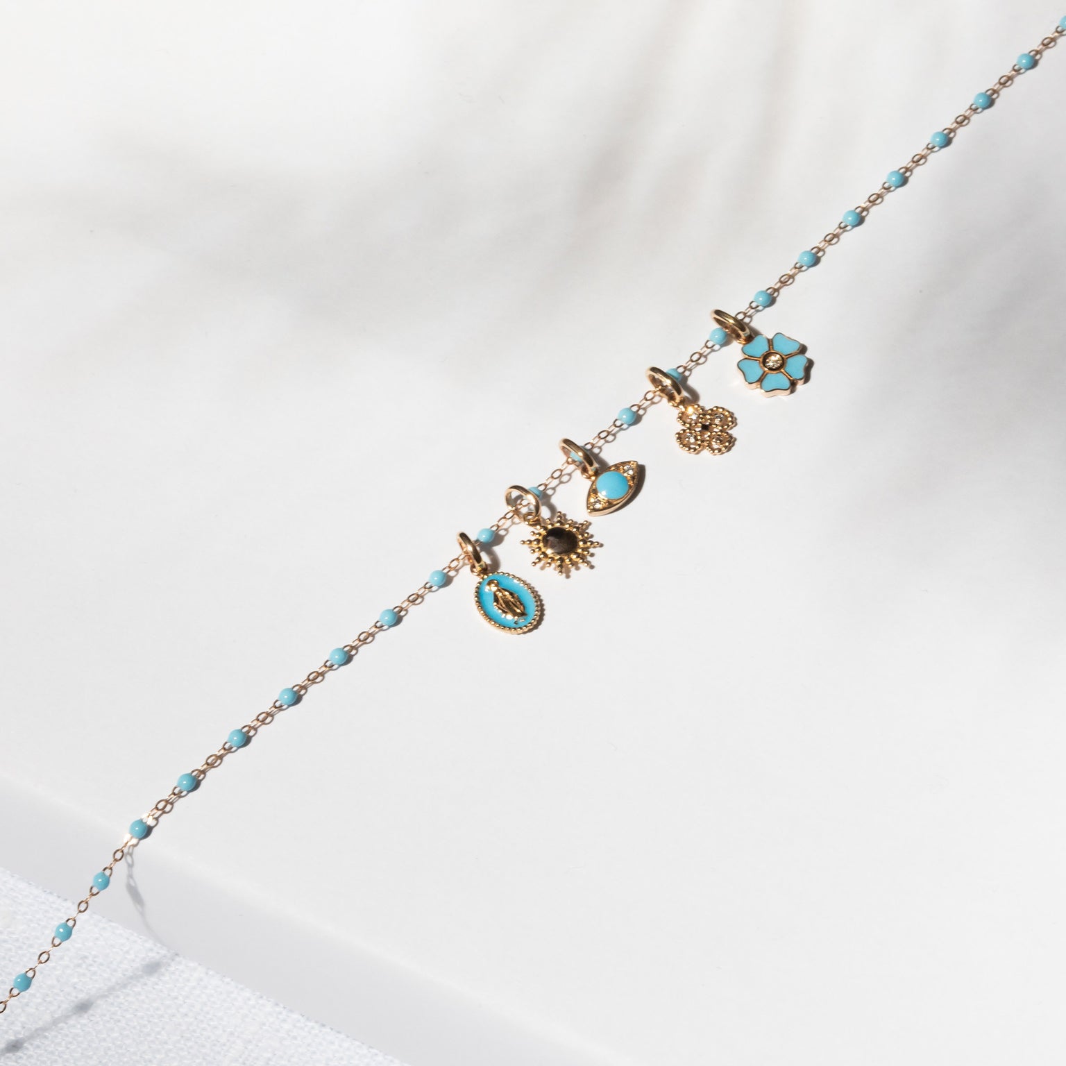 pendentif gigi clozeau collection madone turquoise or rose